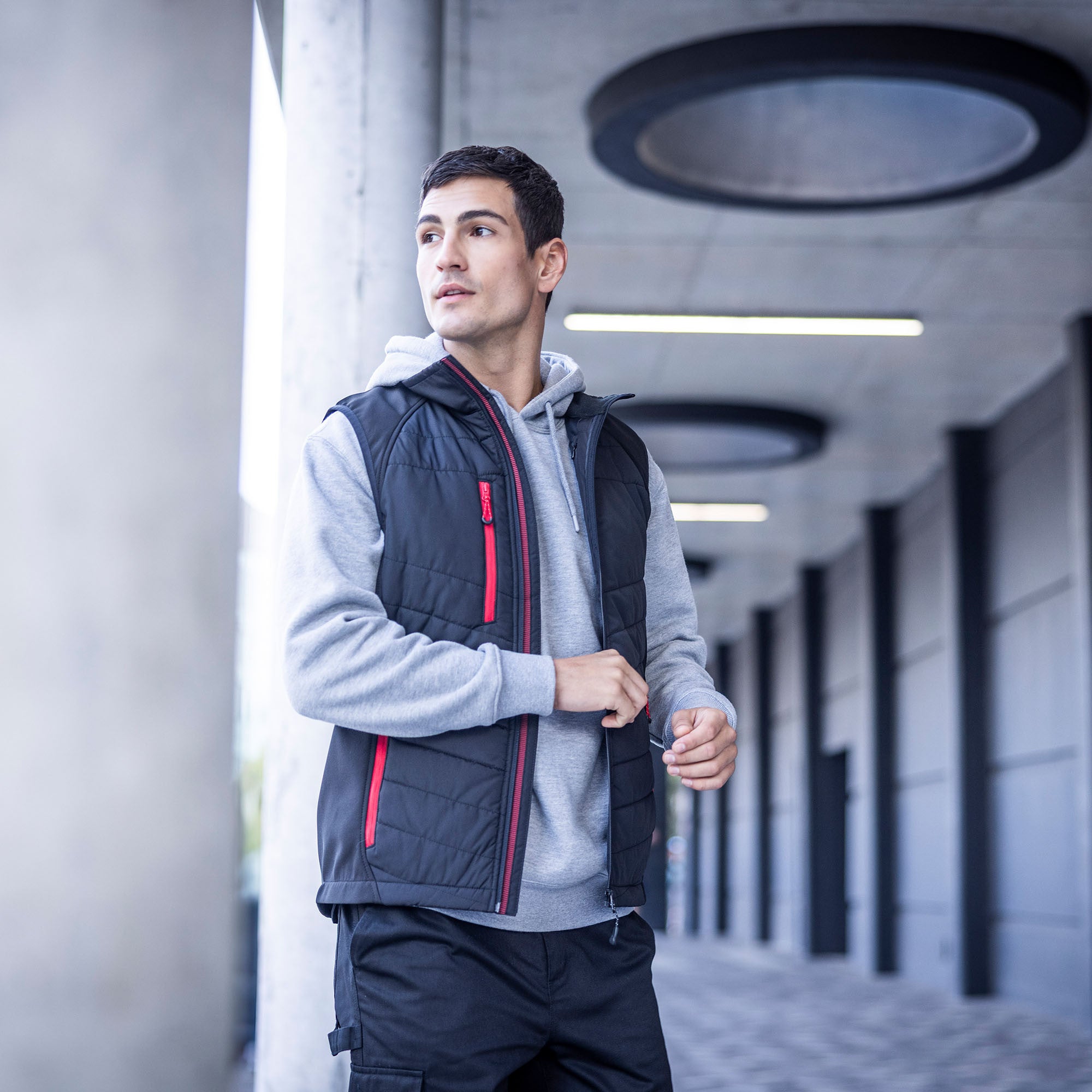 Pro Universal Bodywarmer | BLACK/ORANGE POP